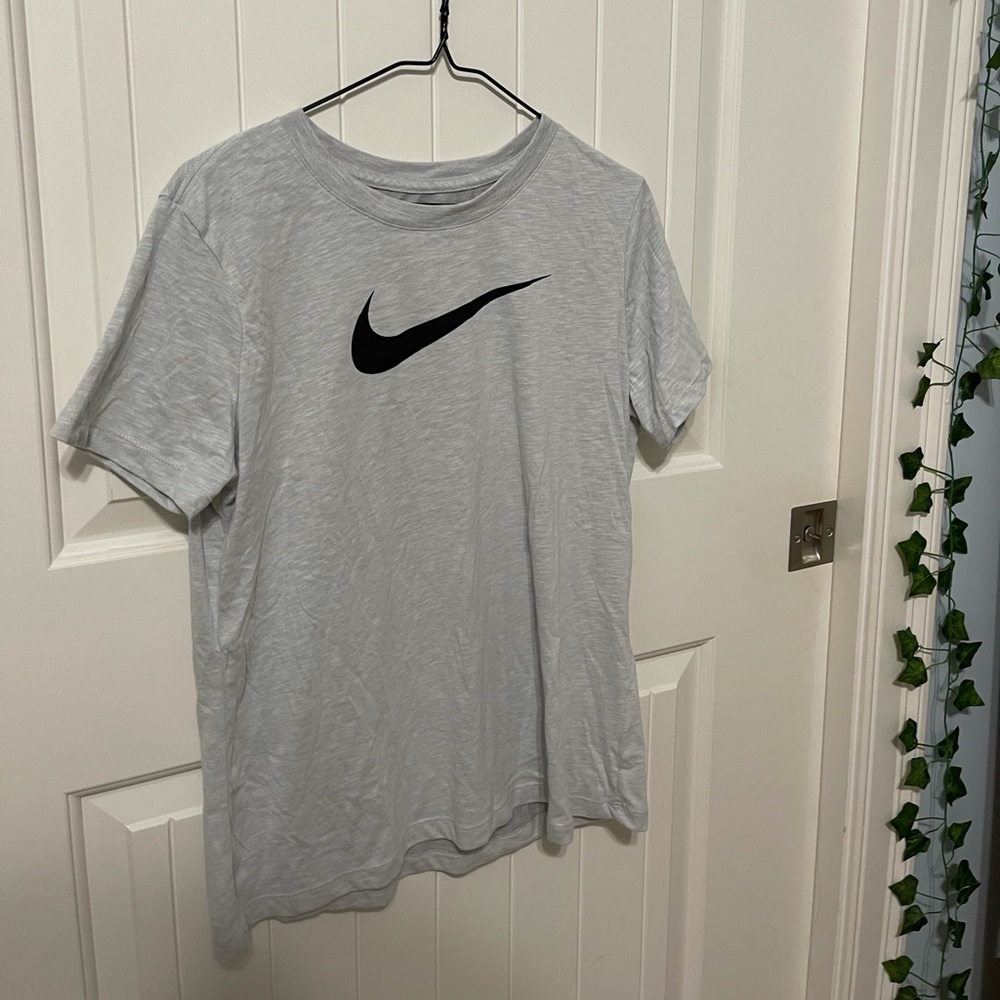Light grey Nike size medium tee shirt
